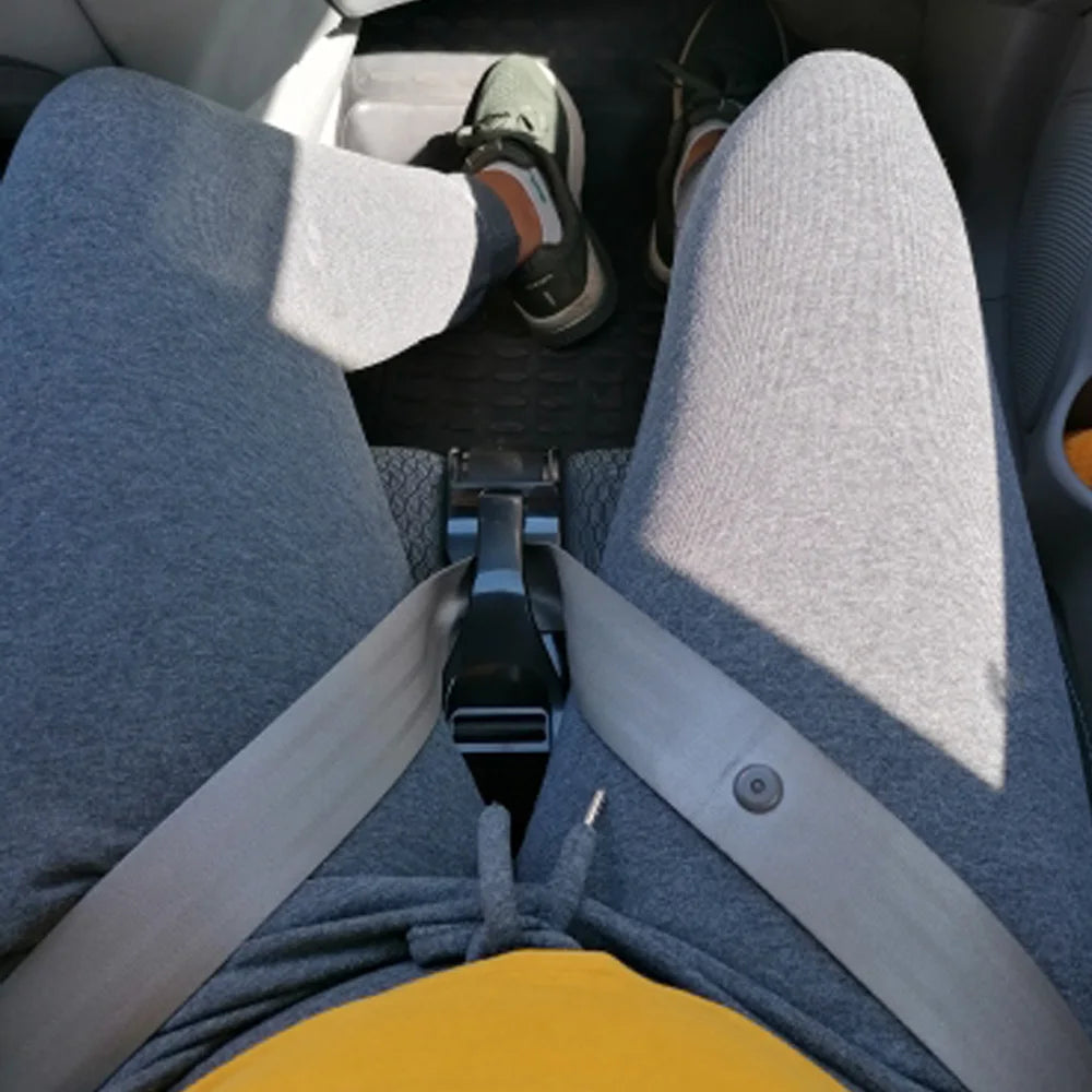 Car seat belt adjuster dispersing impact forces for pregnant women.