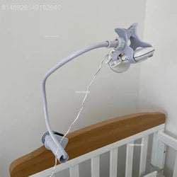 Baby monitor stand with adjustable camera holder